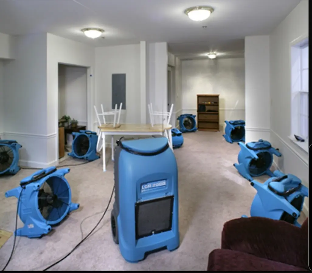 Air movers and dehumidifier setup for Water Damage Restoration in Raisinville